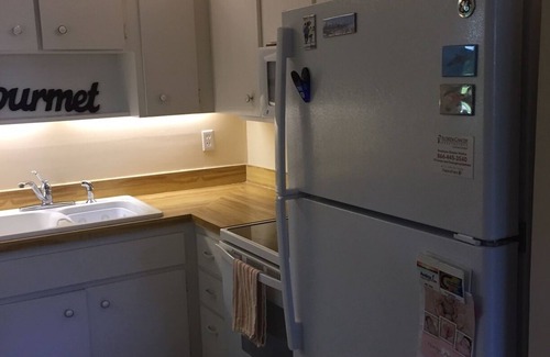 Orchid Island Condo | Vacation Home Steps away from a private beach and pool 55+