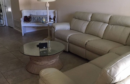Orchid Island Condo | Vacation Home Steps away from a private beach and pool 55+