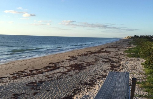 Orchid Island Condo | Vacation Home Steps away from a private beach and pool 55+