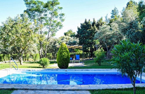 Montecorto House | Vacation Home 'El Rancho' with Mountain View, Pool, Wi-Fi & Garden