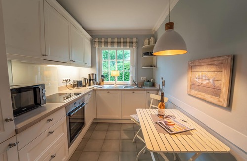 Munkmarsch House | Vacation home for up to 5 people with garden and fireplace.
