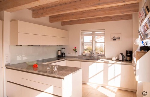 Rosenhagen House | Vacation home " Strand 22 ", on the Baltic Sea, roof terrace, sauna, WLAN by SEASIDE