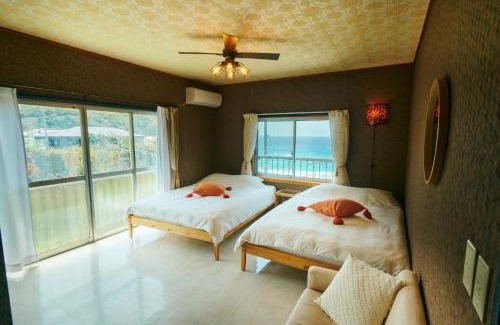 Kozushima-mura Bed & Breakfast | Vacation House Familia