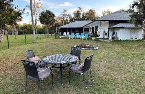 Naples House | Vacation pool home in the woods.