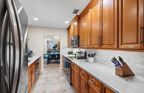 Tropic Palms House | VacationSunwind:Delray Bch home! SW Pool, Fish, Dock, Water front, Close to Bch