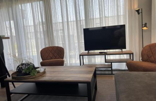 Scherpenisse Ski Chalet | Vakantiepark de Zeeuwse Parel - de Zeebries