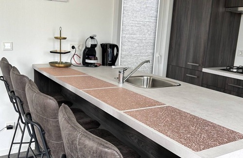 Scherpenisse Ski Chalet | Vakantiepark de Zeeuwse Parel - Noordzee Deluxe
