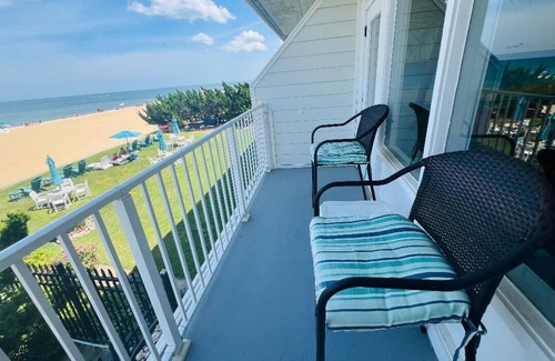 Northeast Virginia Beach Condo | VB Oceanfront Condo at Boardwalk. See Dolphins from Balcony. Steps to Beach+Pool