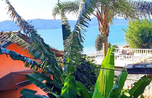 Florianopolis Cottage | Veranda - Charming 3-bedroom Cottage with AC in Peacefull Daniela Florianopolis
