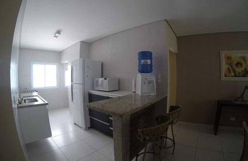Praia Grande Apartment | very beautiful apartment with excellent sea view, with hot and cold pools.