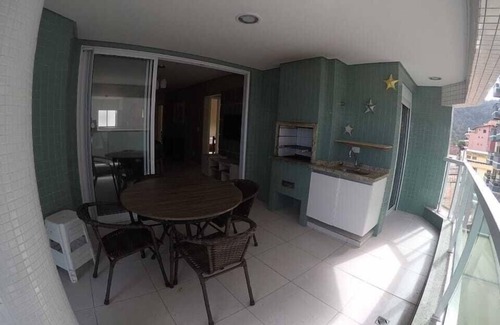 Praia Grande Apartment | very beautiful apartment with excellent sea view, with hot and cold pools.