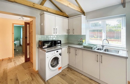 New Romney Cottage | Very spacious property across the road from a lovely golden sanded beach.