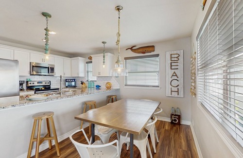 Rockport House | Vibrant bay front home with fenced yard & large decks - steps to sand & fishing