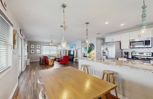 Rockport House | Vibrant bay front home with fenced yard & large decks - steps to sand & fishing