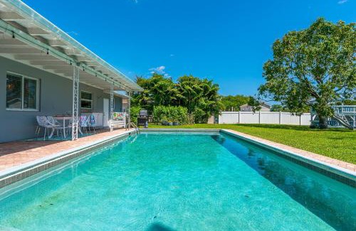 West Palm Beach Villa | Vibrant Pool Home! Kayak, Firepit & Playground!