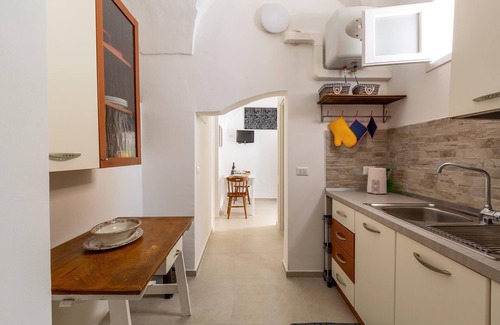 Tuglie House | Vico dei Mille by BarbarHouse