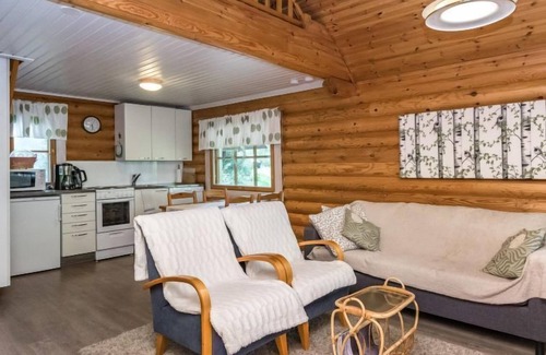Hiukkajoki House | Vihreä Mökki by Interhome