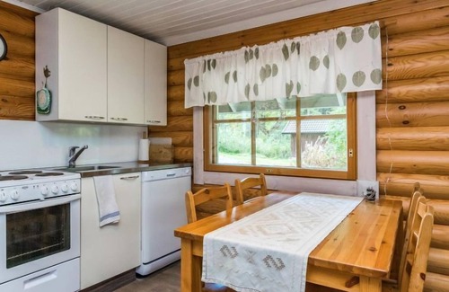 Hiukkajoki House | Vihreä Mökki by Interhome