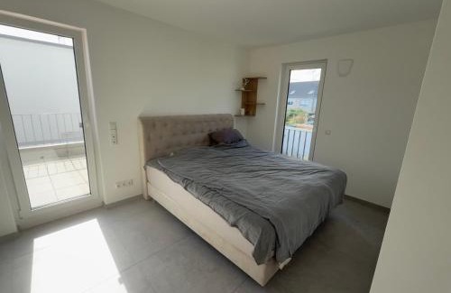 Baumberg Apartment | Villa am Rhein in Monheim