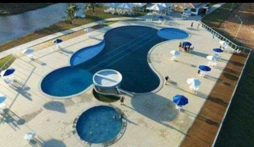 Estancia Apartment | Villa das Águas - Térreo frente lago