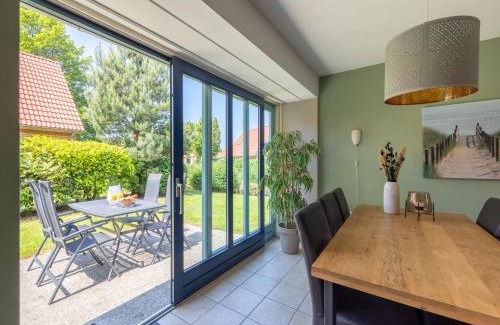 Andijk House | Villa in Friesland with Garden by Water