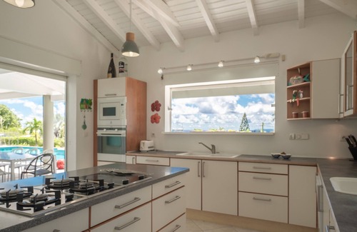 Saint-Francois Villa | Villa Karukera offers breathtaking sea views from its infinity pool