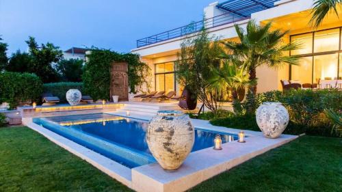 Essaouira Villa | Villa luxeuse et climatisee sur le golf, piscine chauffee