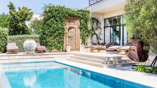 Essaouira Villa | Villa luxeuse et climatisee sur le golf, piscine chauffee
