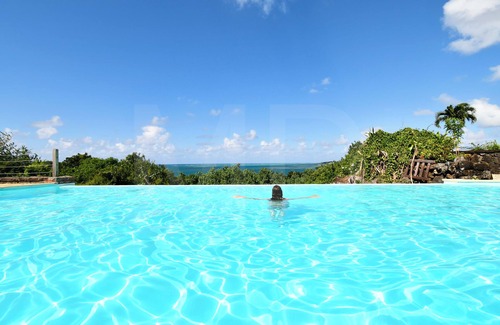 Trou d'Eau Douce Villa | Villa Maya overlooking the bay, Jacuzzi, jetted bathtubs, pool table