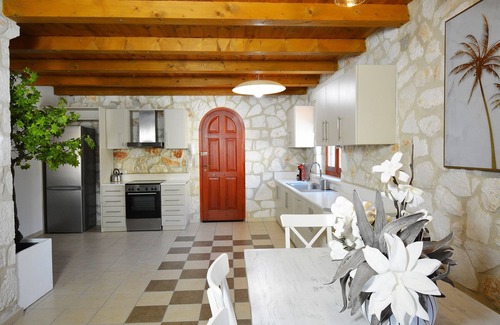 Akrotiri Villa | Villa Nephele of Jootiq Villas. Combine traditional stone built concept with supreme comfort!