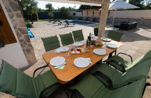 Benkovac Villa | Villa Pietra- Modern rustic poolside oasis
