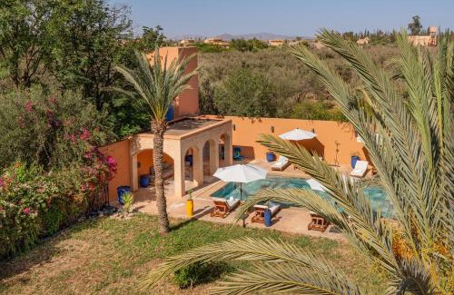 Annakhil Villa | Villa Simari Palmeraie Marrakech NOUVEAU! Petit déjeuner compris-Entièrement rénovée-Superbe piscine privée chauffée-Personnel de maison inclus-Grand jardin de 2000m2-Terrain de pétanque-Ambiance typique berbère-Havre de paix