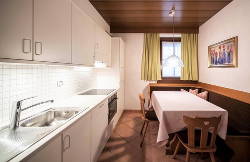 Ortisei Apartment | Villa Stella Apartment N52 near the ski lifts. Wi-Fi, terrace and garden