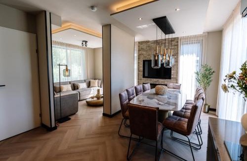 Waarland House | Villa Watergloed a stylish, brand new holiday home for 16 people