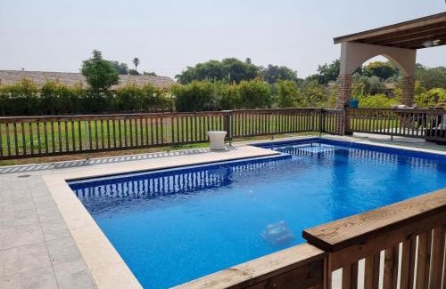 Tal Shahar Villa | Villa with a pool in a beautiful garden