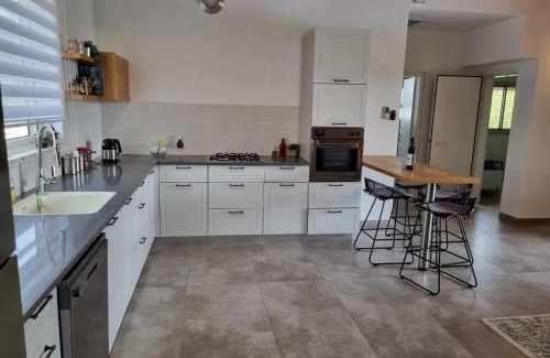 Tal Shahar Villa | Villa with a pool in a beautiful garden