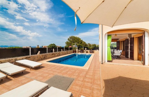 Urbanizacion Mont Ferrutx Ski Chalet | Villa with pool and sea views.
