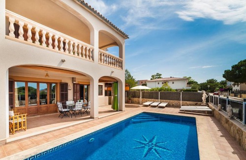 Urbanizacion Mont Ferrutx Ski Chalet | Villa with pool and sea views.