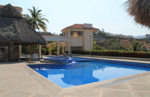 Las Hadas Apartment | Villas del Palmar Manzanillo with Beach Club