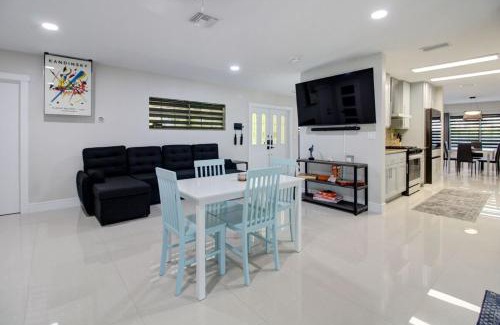 Miami Lakes House | Vista Azul Lake Front Home with Hot Tub and Swim Spa, Fishing Dock, Gym, Game Room with Darts, Ping Pong, A Pool Table and more!