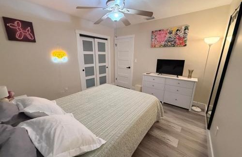 Miami Lakes House | Vista Azul Lake Front Home with Hot Tub and Swim Spa, Fishing Dock, Gym, Game Room with Darts, Ping Pong, A Pool Table and more!