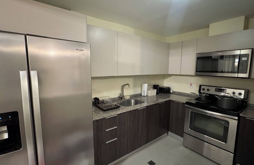 Arouca Condo | Vive Luxe Condo , Pool & 24/7 Security near Airport