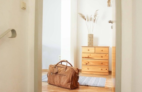 Rakow Apartment | W2 Family-friendly duplex apartment with a lagoon view and garden