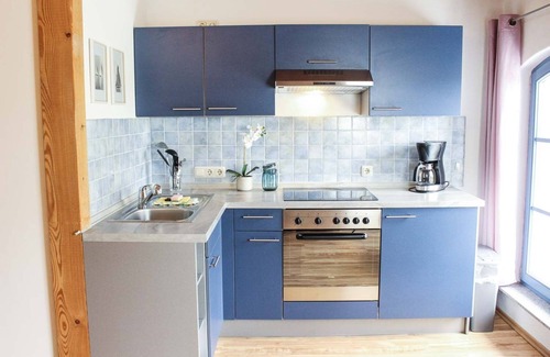 Rakow Apartment | W2 Family-friendly duplex apartment with a lagoon view and garden
