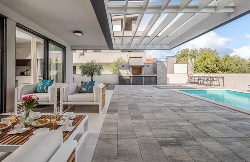 Porat House | Wake up in the morning to magnificent sea views in this luxury vacation home.