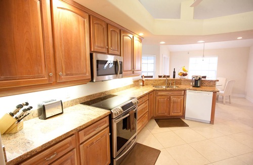 Marco Island House | Walk to Beach, Restaurants, Shops, Movies. Water Front, Large Heated Pool, Dock