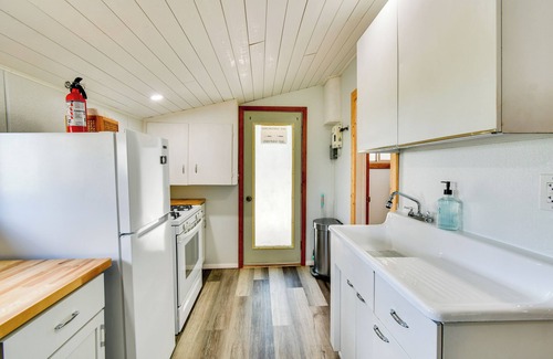Prudenville Cottage | Walk to Houghton Lake: Cabin w/Fire Pit!