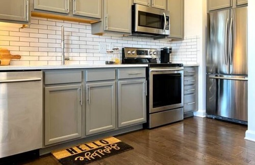 Italian Village Condo | Wall of Windows - Luxe Flat