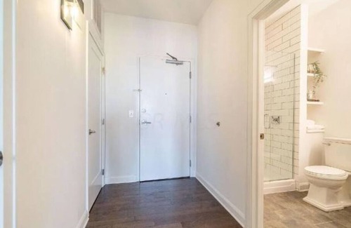 Italian Village Condo | Wall of Windows - Luxe Flat