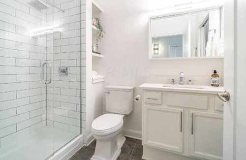 Italian Village Condo | Wall of Windows - Luxe Flat